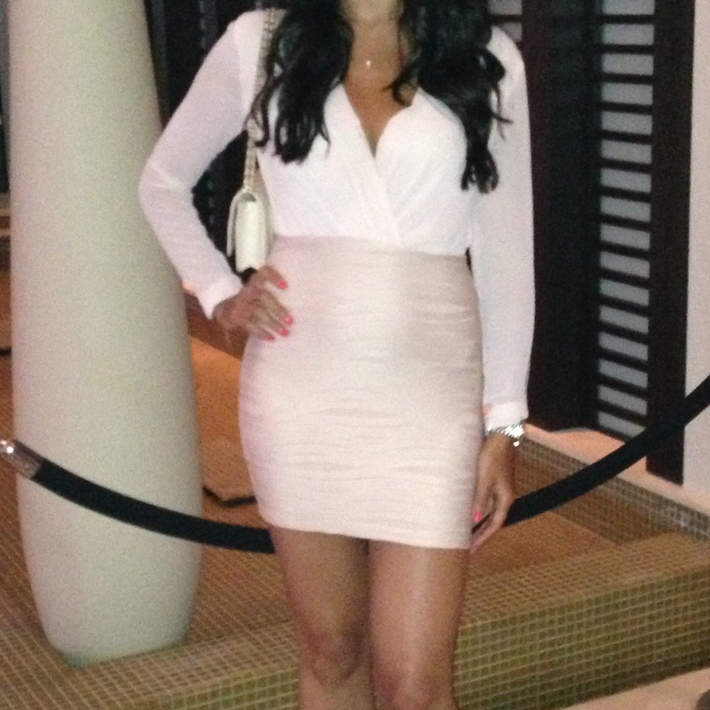 Bec and Bridge bodycon mini dress. Color is blush.